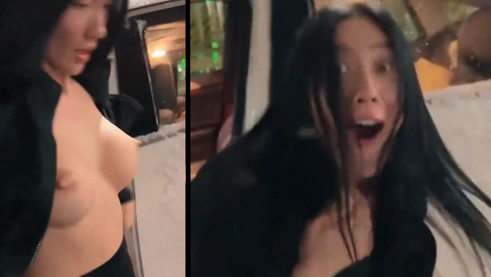 Guy opens a woman jacket to see her tits