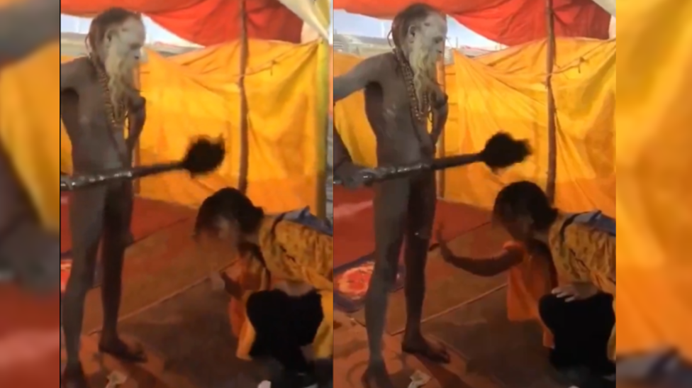 Tourist girl touches the penis of a spiritual Indian