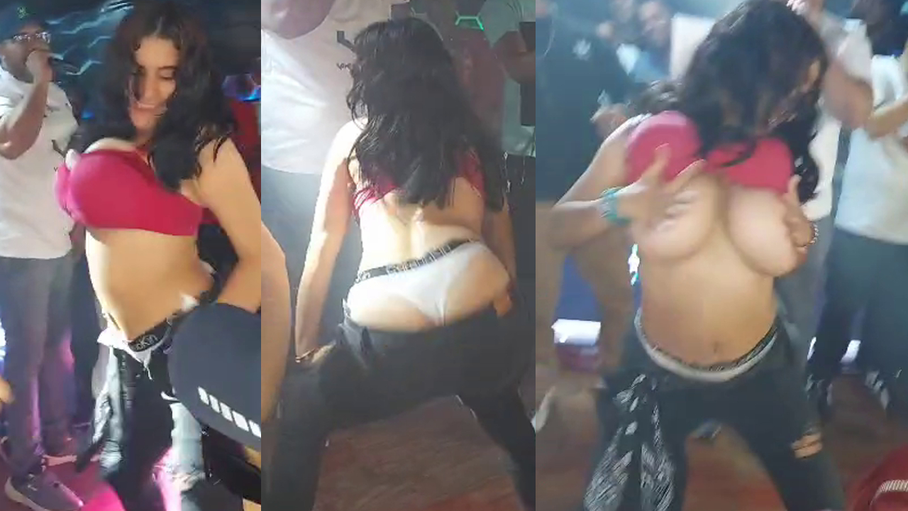 Shy Dominican girl shows off her huge tits at a party