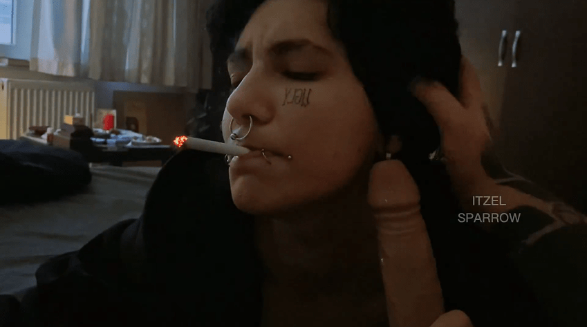 My girl smokes and sucks my dildo